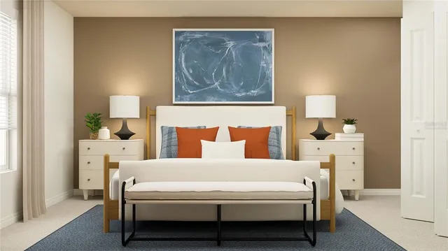 a bedroom with a bed and lamp