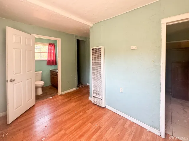 a view of an empty room and window