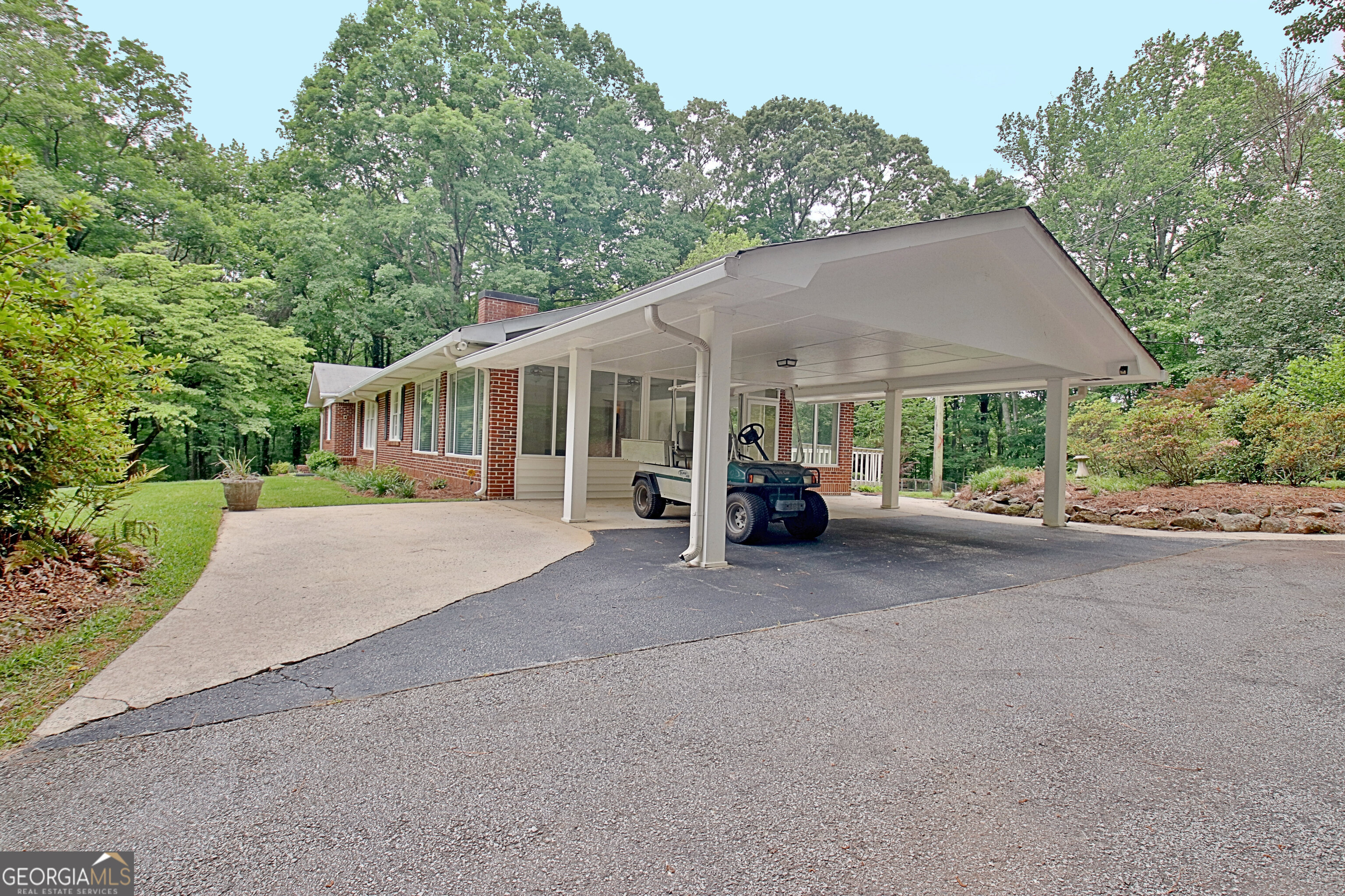 717 Tyrone Road Tyrone, GA 30290 - Photo 5 of 58 a view of a house and outdoor space