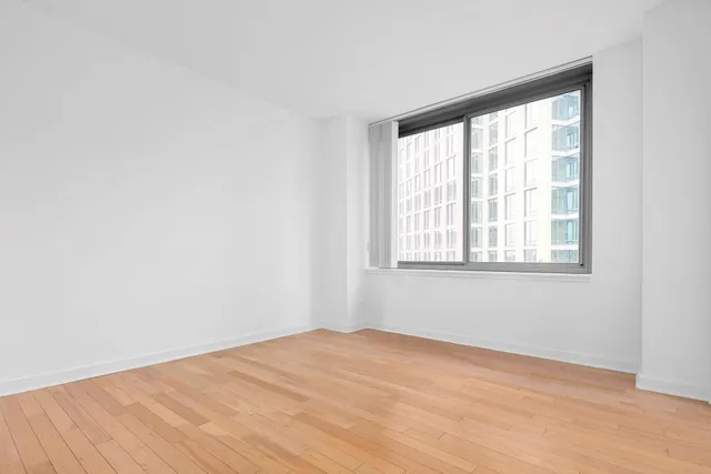 a kitchen with stainless steel appliances a refrigerator stove and microwave