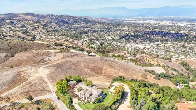 a view of an outdoor space and mountain view in back