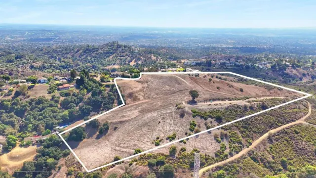 a view of a city with mountain