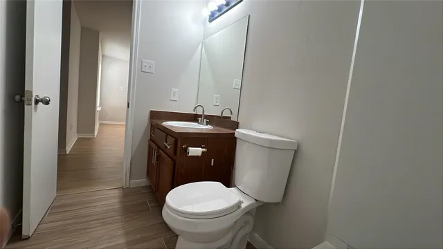 a bathroom with a sink and toilet