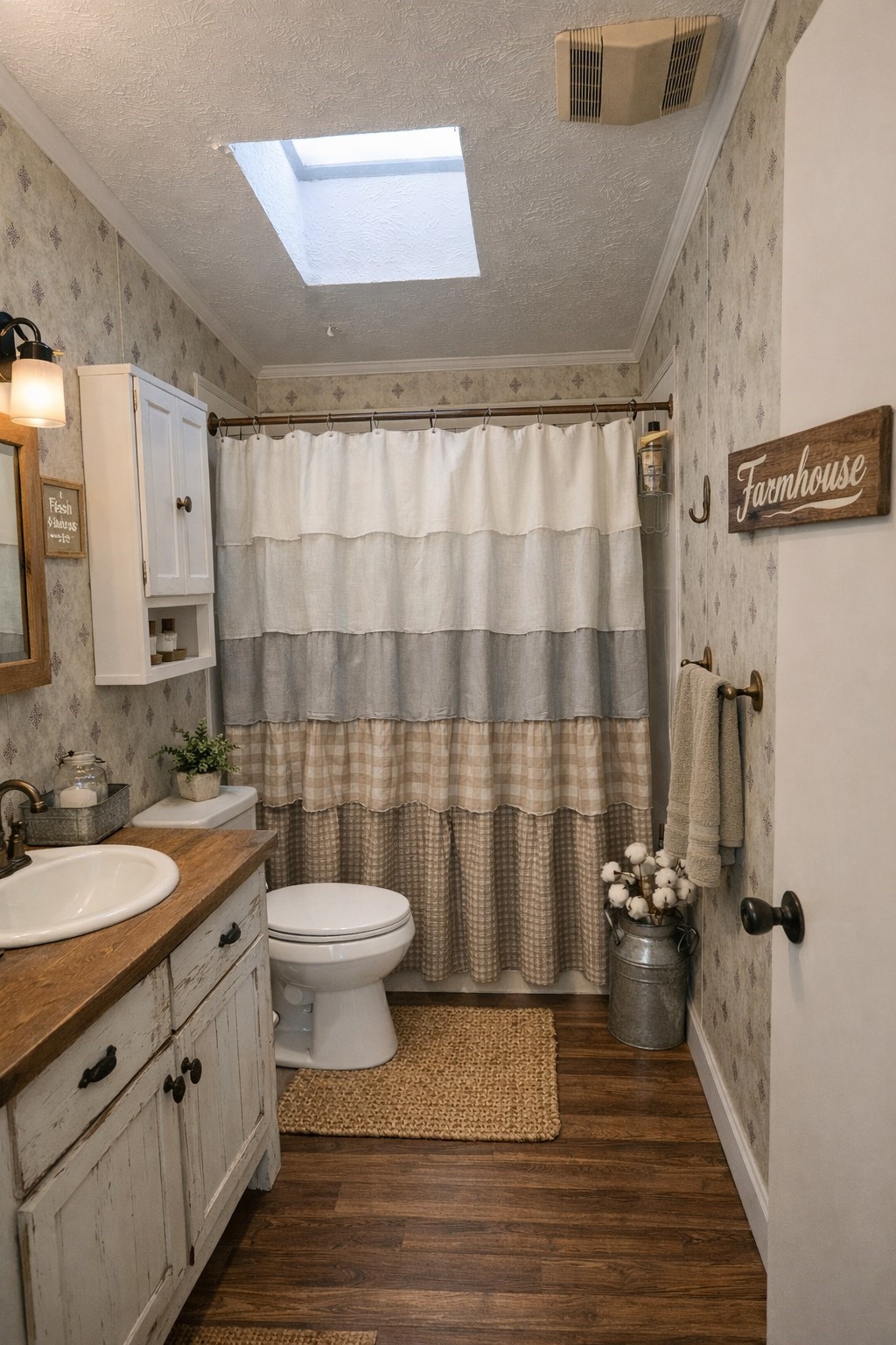 1202 County Road 1099 Wiergate, TX 75977 - Photo 8 of 22 a bathroom with a sink a toilet a mirror and shower