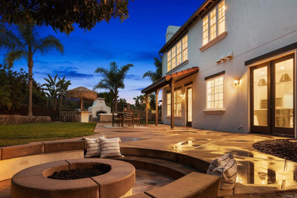 707 Olympus Street Encinitas, CA 92024 - Photo 3 of 47 a swimming pool with outdoor seating and yard