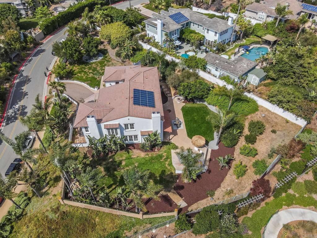707 Olympus Street Encinitas, CA 92024 - Photo 5 of 47 an aerial view of a house with a yard and garden