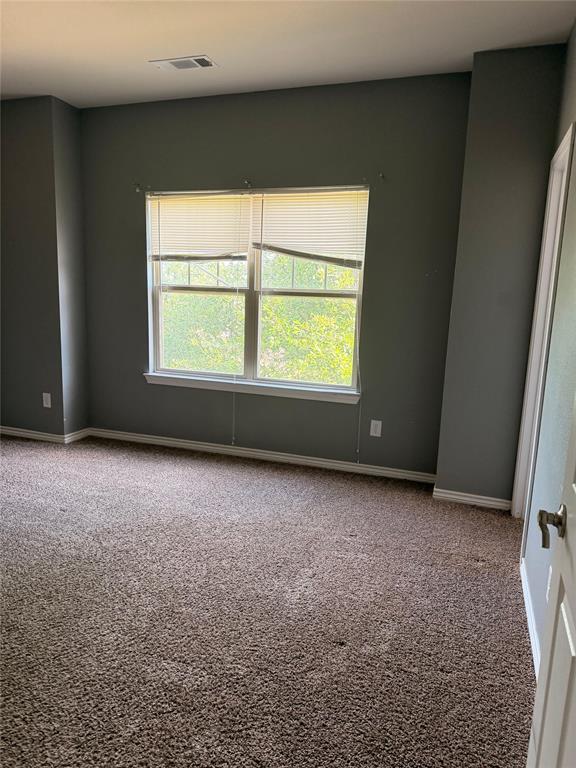 5516 Del Rey Drive Denton, TX 76208 - Photo 8 of 16 an empty room with a window