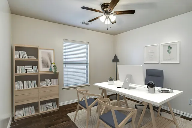 a view of a dining room with furniture