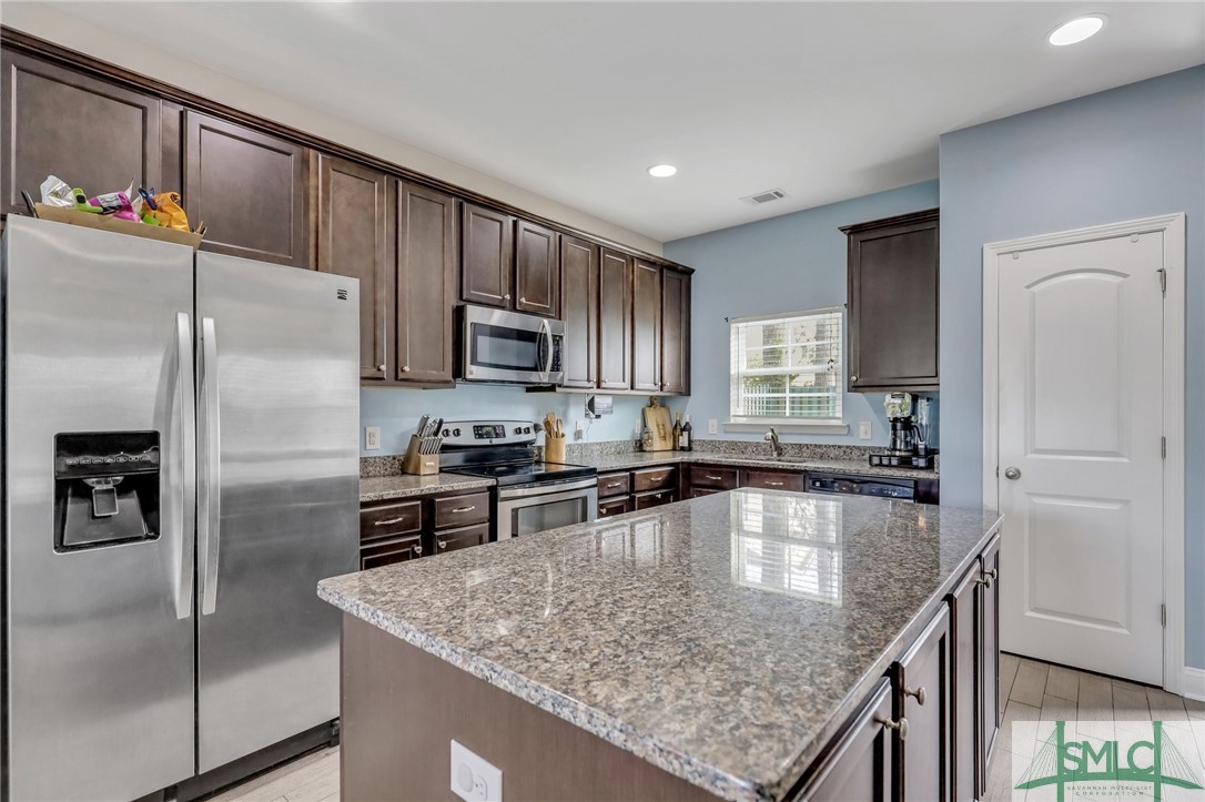 80 Smoke Rise Road Richmond Hill, GA 31324 - Photo 12 of 42 Great working kitchen with pantry