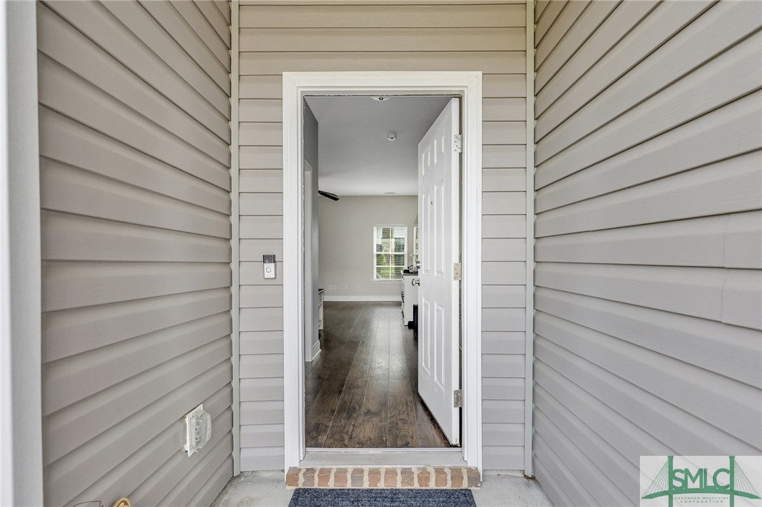 80 Smoke Rise Road Richmond Hill, GA 31324 - Photo 5 of 42 Covered front porch