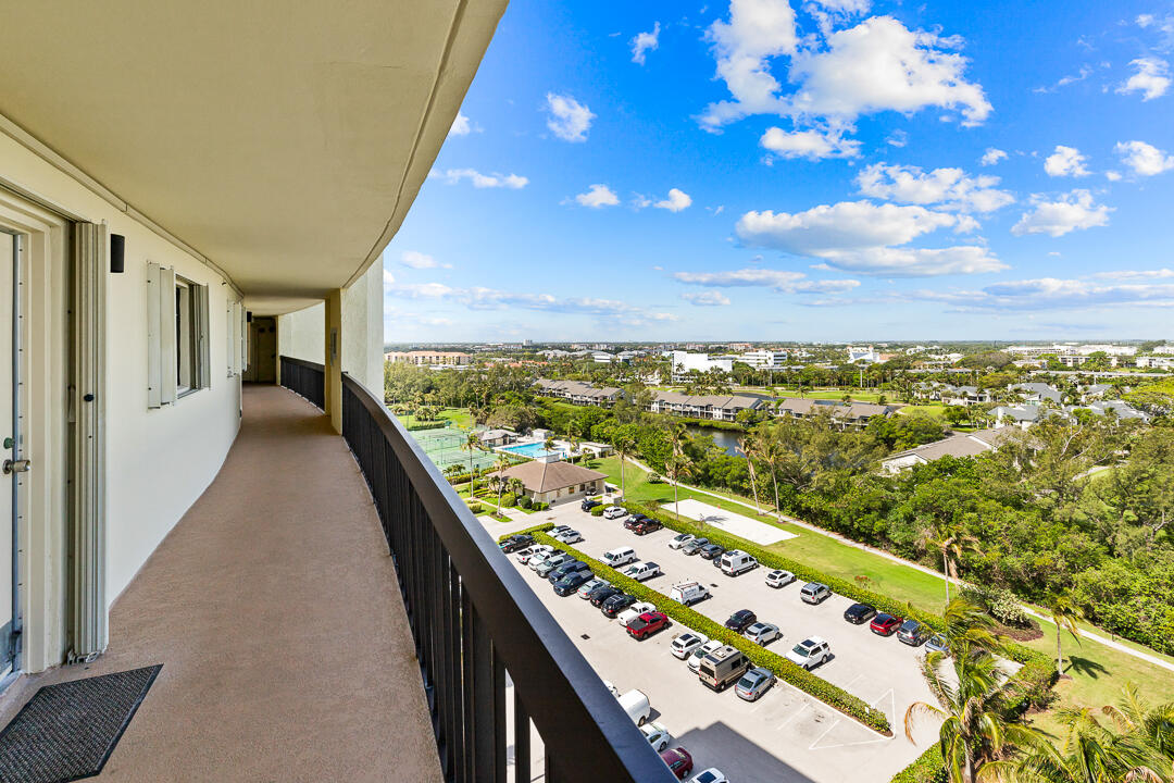 400 Ocean Trail Way, Unit 1108 Jupiter, FL 33477 - Photo 33 of 41 a view of balcony with wooden floor and city view