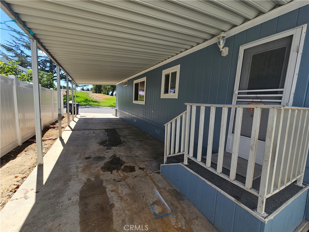 1721 East Colton Avenue, Unit 33 Redlands, CA 92374 - Photo 17 of 17 a view of a balcony with wooden floor