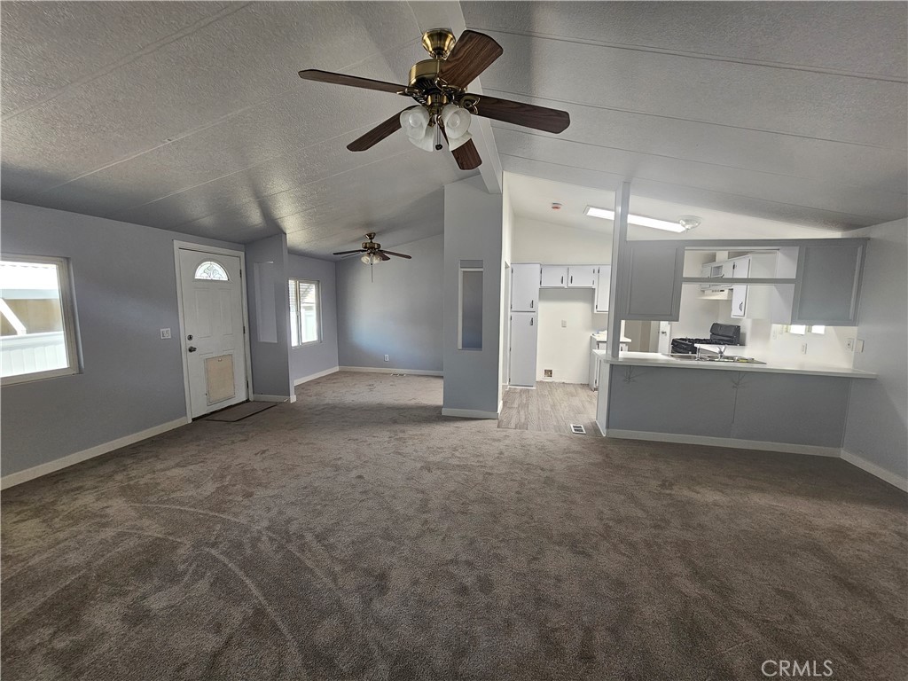 1721 East Colton Avenue, Unit 33 Redlands, CA 92374 - Photo 4 of 17 a view of a kitchen with a sink and a window