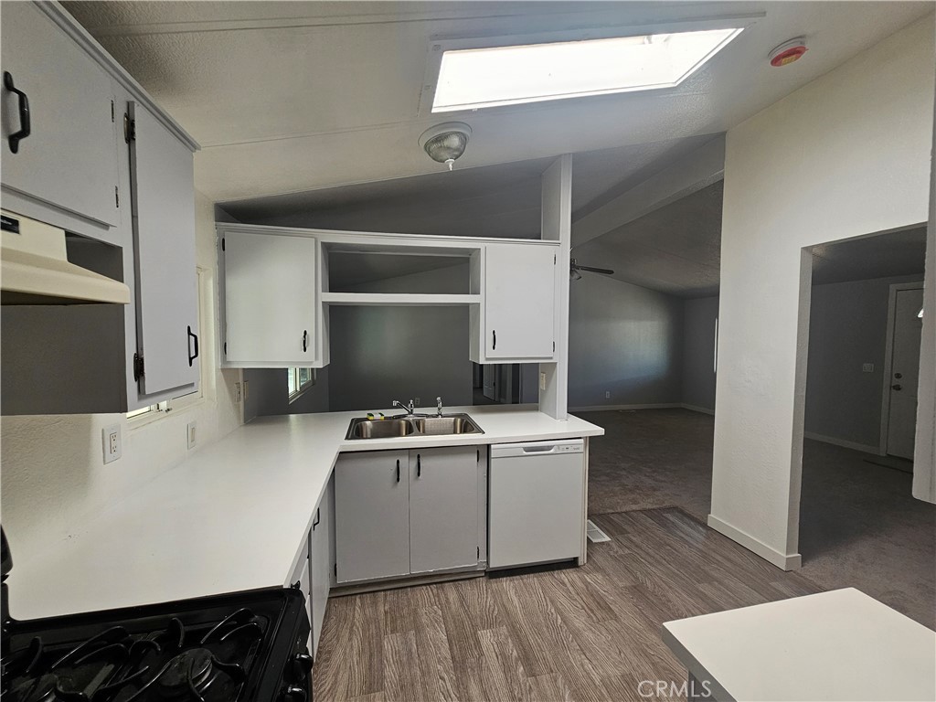1721 East Colton Avenue, Unit 33 Redlands, CA 92374 - Photo 5 of 17 a room with a stove and a refrigerator