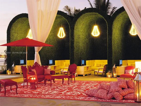 a view of swimming pool with a patio