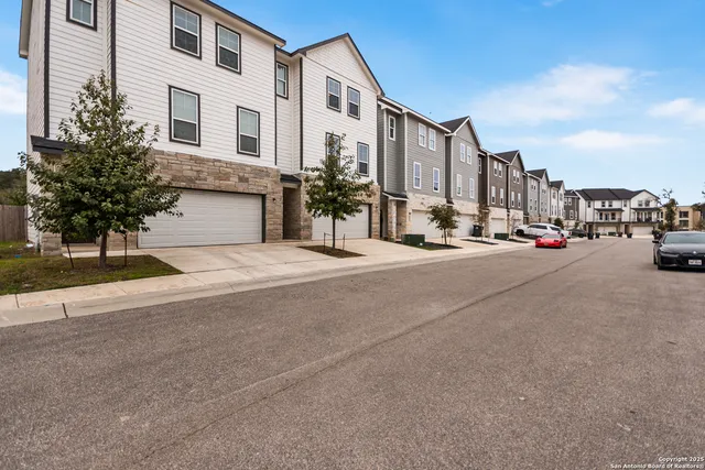 a view of a street with cars