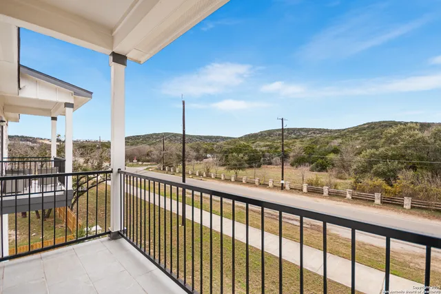 a view of a city from a balcony