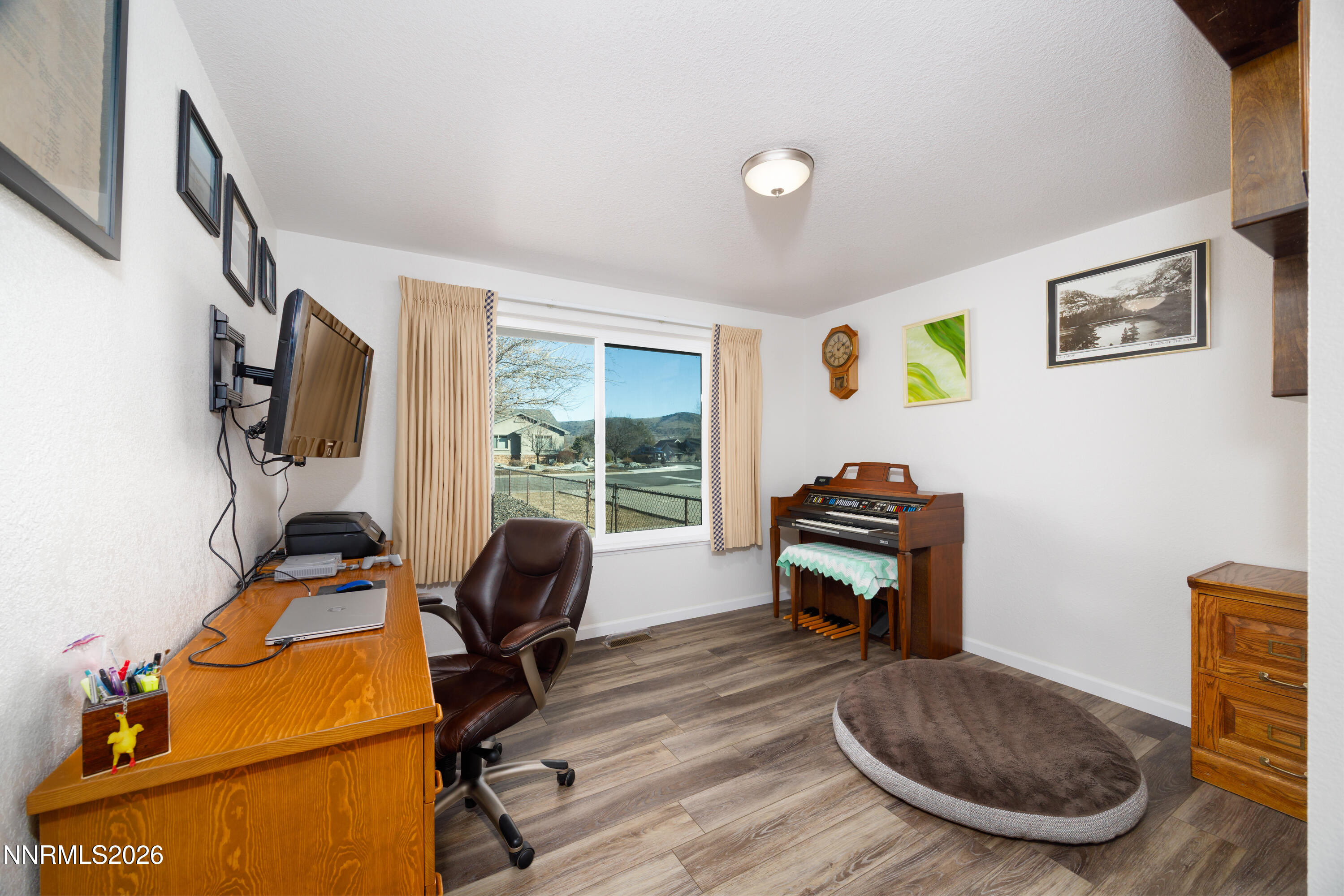 450 Riparian Way Carson City, NV 89701 - Photo 15 of 27 a room with furniture and a window