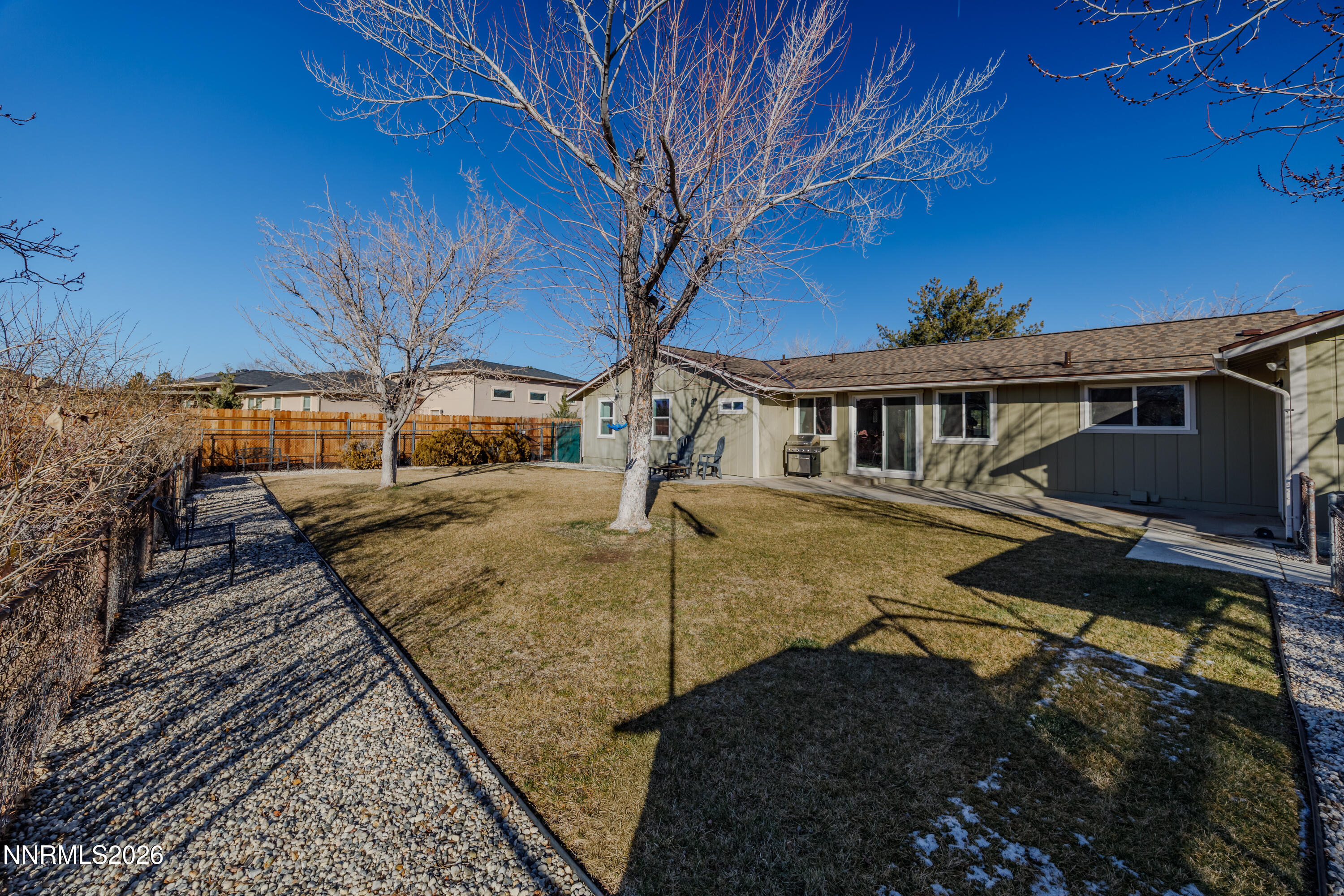 450 Riparian Way Carson City, NV 89701 - Photo 19 of 27 a view of a house with a patio