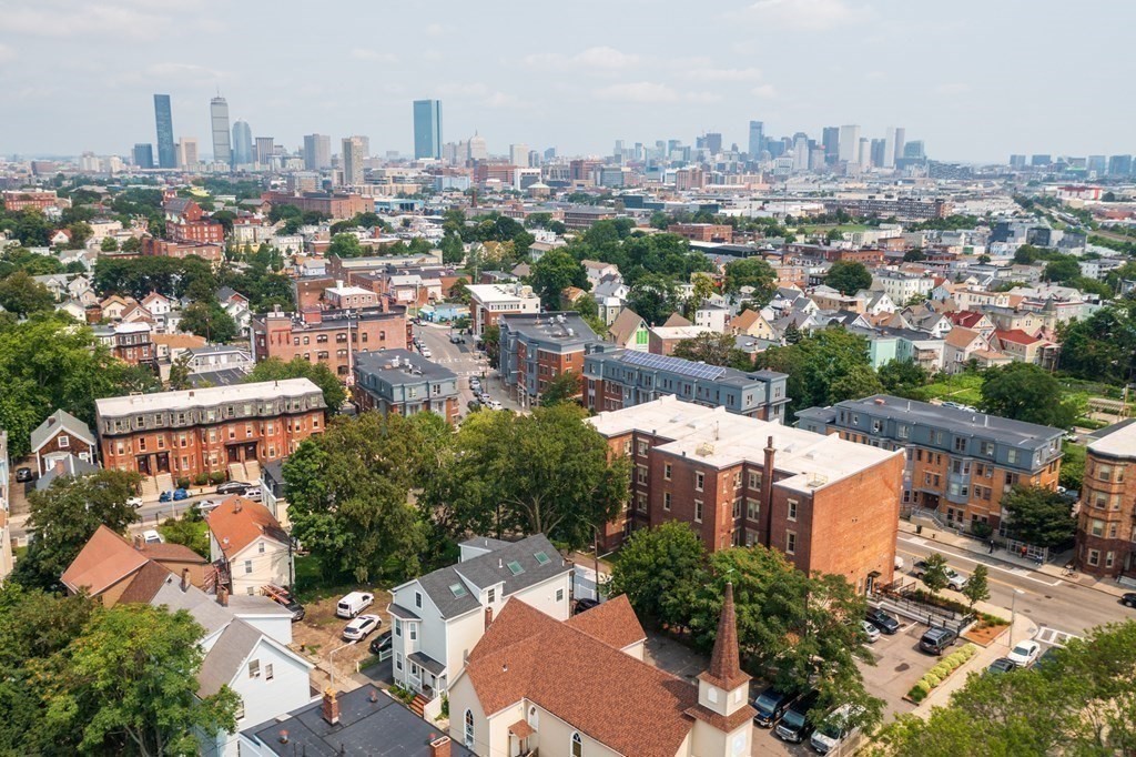 1-3 Howard Place, Unit B Boston, MA 02125 - Photo 19 of 25 an aerial view of a city with lots of residential buildings