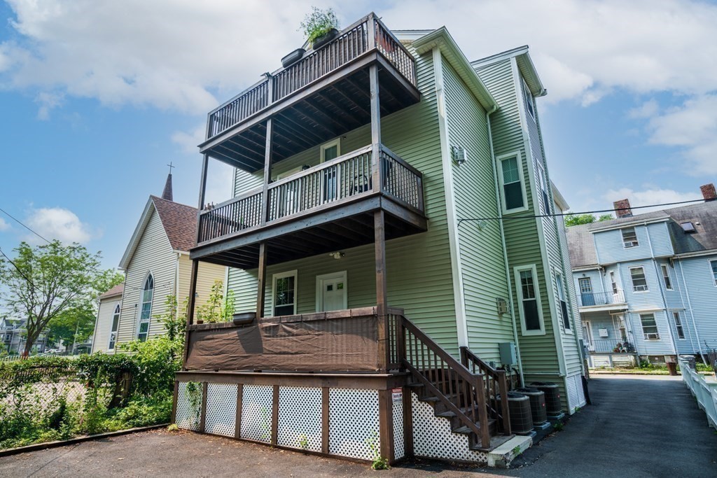 1-3 Howard Place, Unit B Boston, MA 02125 - Photo 22 of 25 a house view with a garden space
