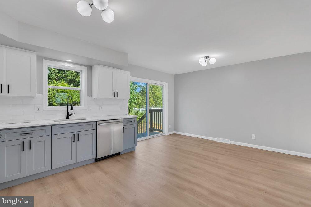 345 Spruce Street Bridgeton, NJ 08302 - Photo 31 of 43 a kitchen with a sink cabinets and window