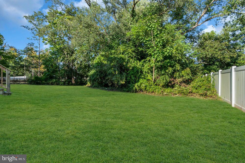 345 Spruce Street Bridgeton, NJ 08302 - Photo 42 of 43 a view of a green field with wooden fence