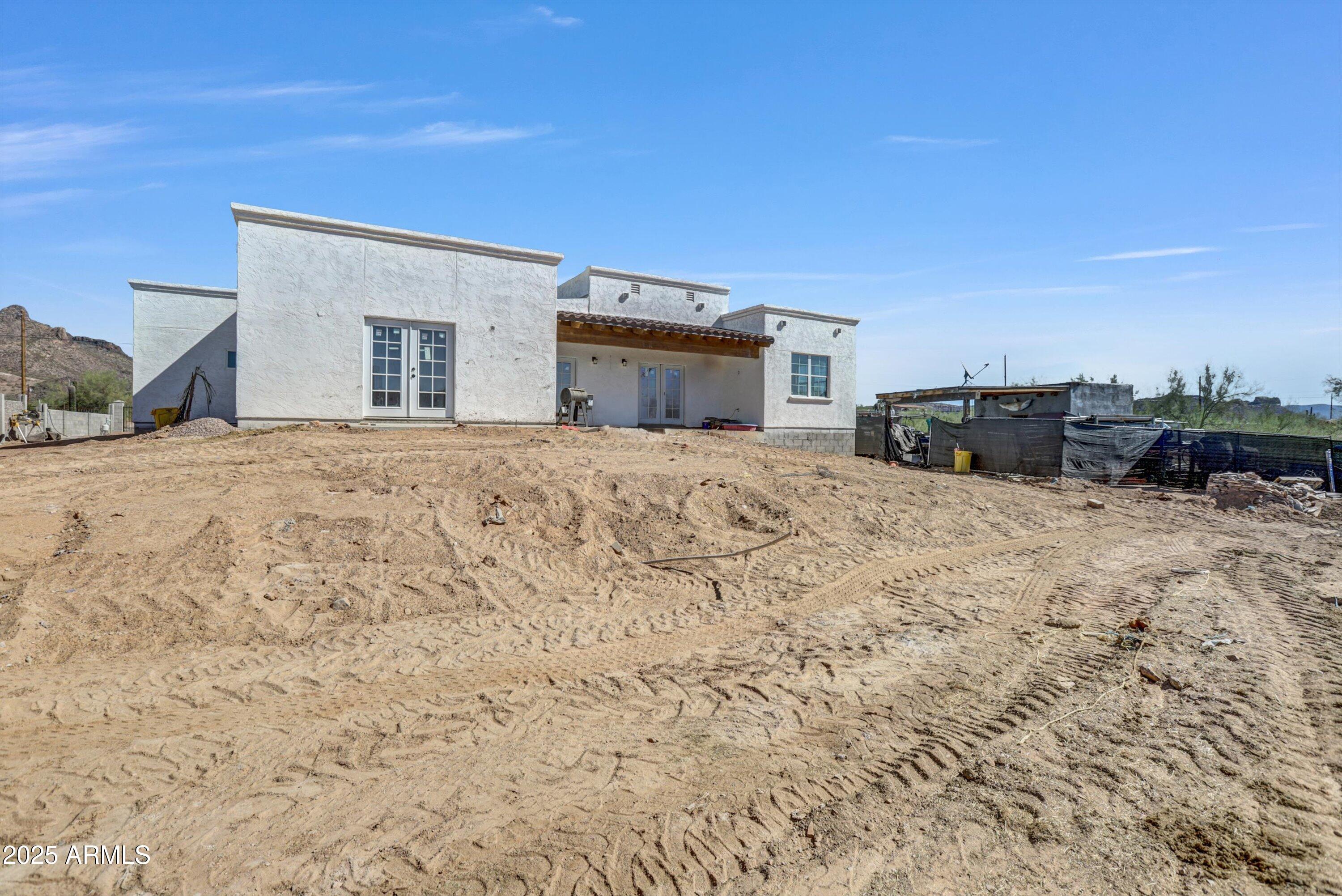 317 West Frontier Street Apache Junction, AZ 85120 - Photo 2 of 28 a view of a house with a snow in the background