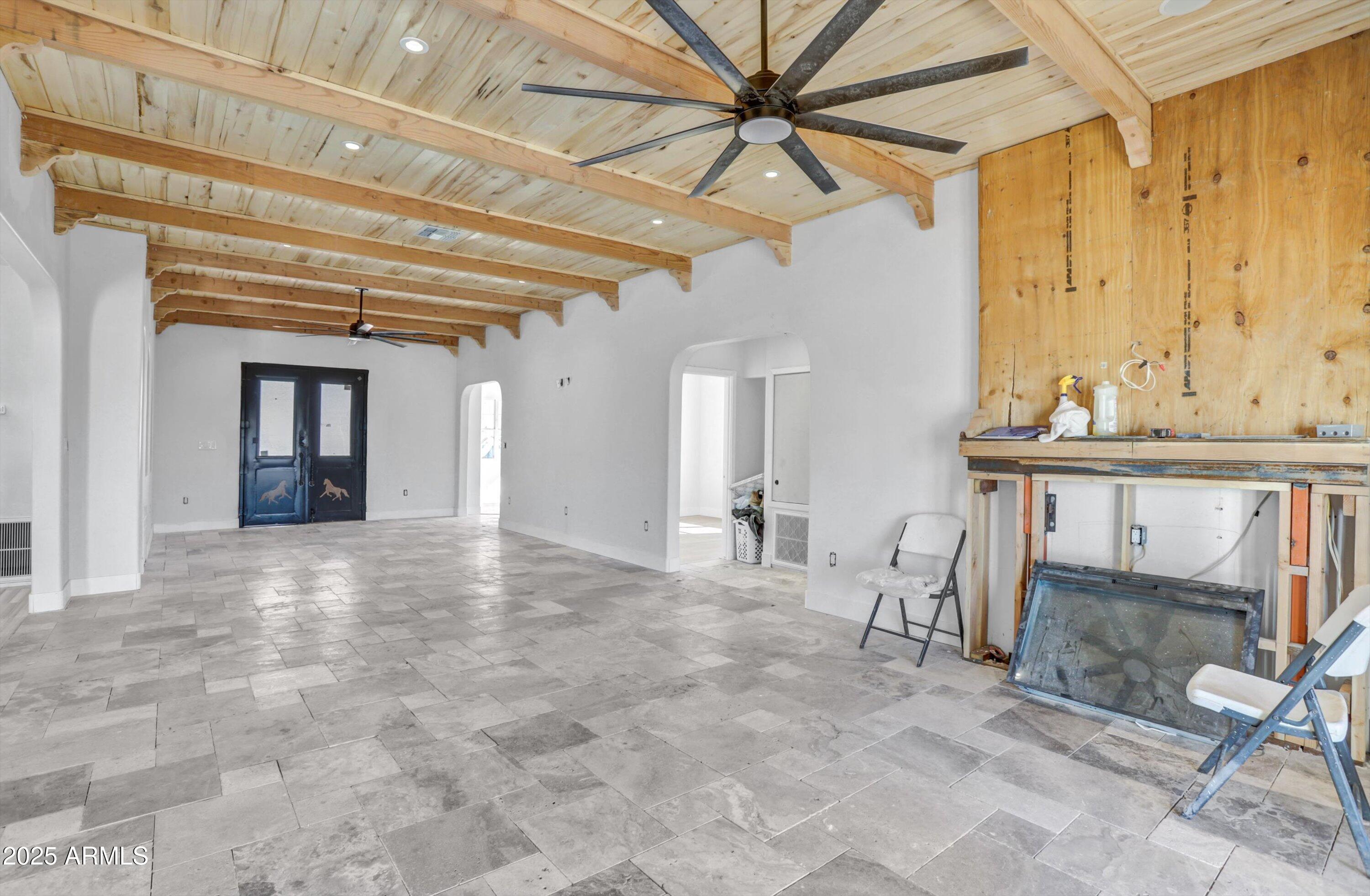 317 West Frontier Street Apache Junction, AZ 85120 - Photo 27 of 28 a view of a livingroom with a furniture a ceiling fan and window