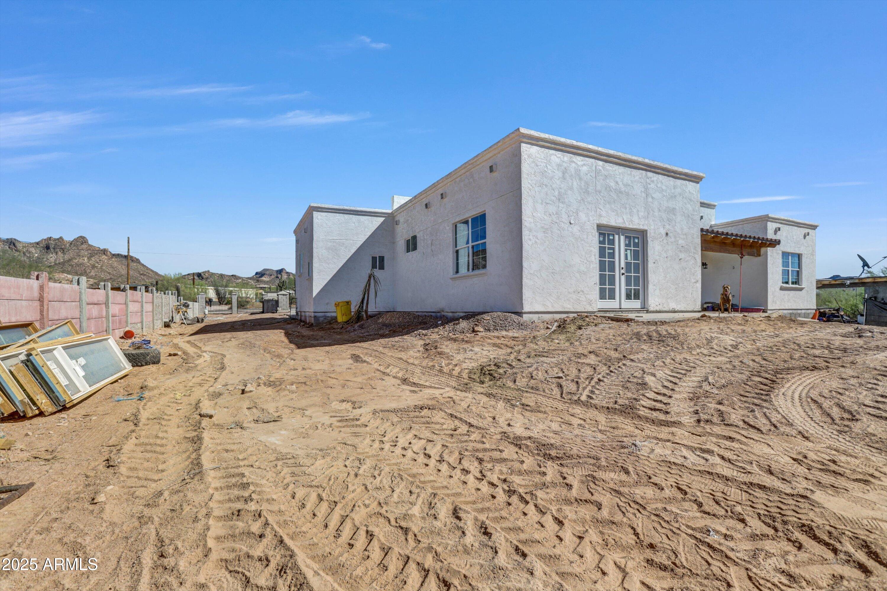 317 West Frontier Street Apache Junction, AZ 85120 - Photo 3 of 28 a view of a house with a snow in the background
