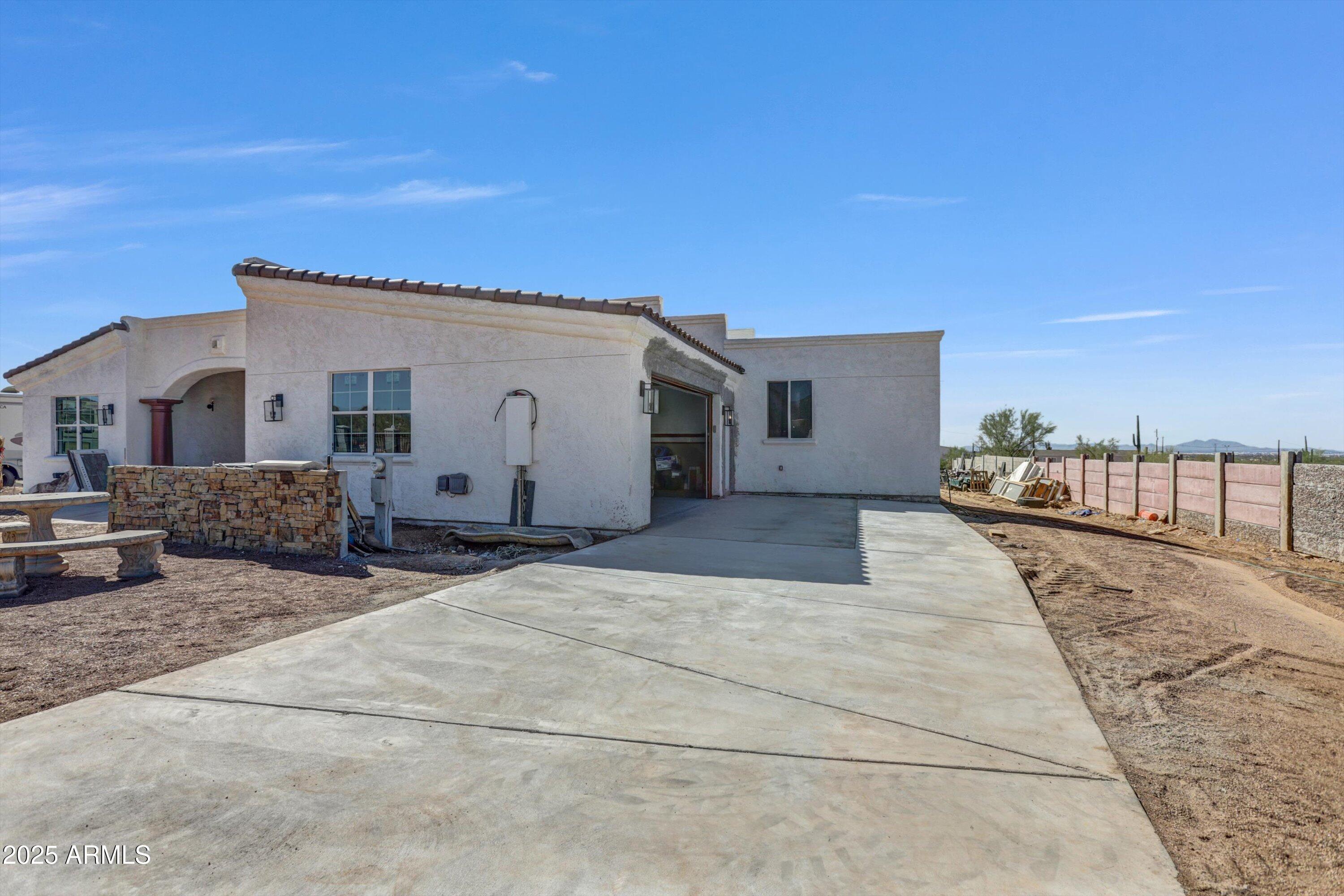 317 West Frontier Street Apache Junction, AZ 85120 - Photo 5 of 28 a view of a house with backyard