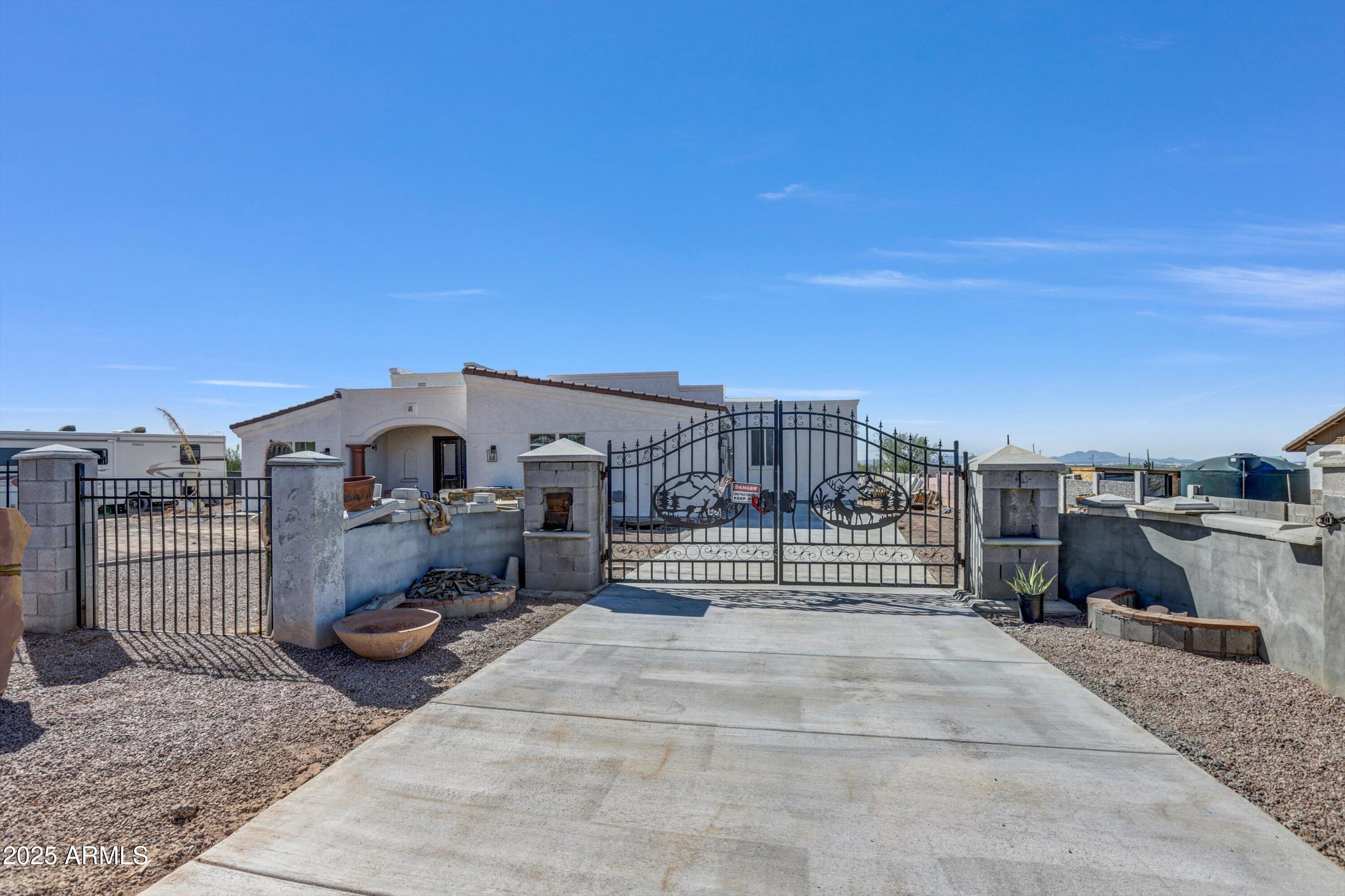 317 West Frontier Street Apache Junction, AZ 85120 - Photo 7 of 28 a roof deck with a barbeque