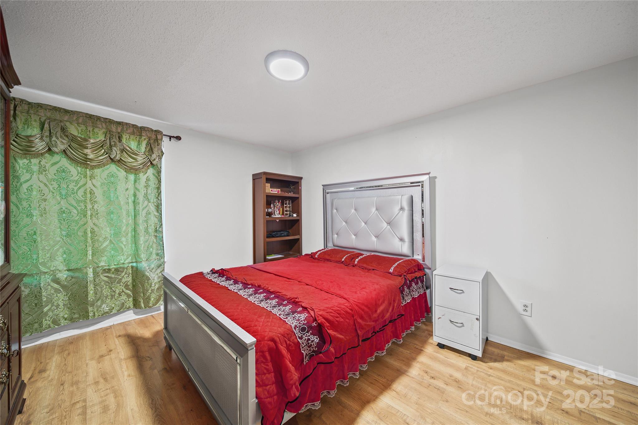 4823 Smokehollow Road Charlotte, NC 28227 - Photo 15 of 31 a bedroom with a bed and a window