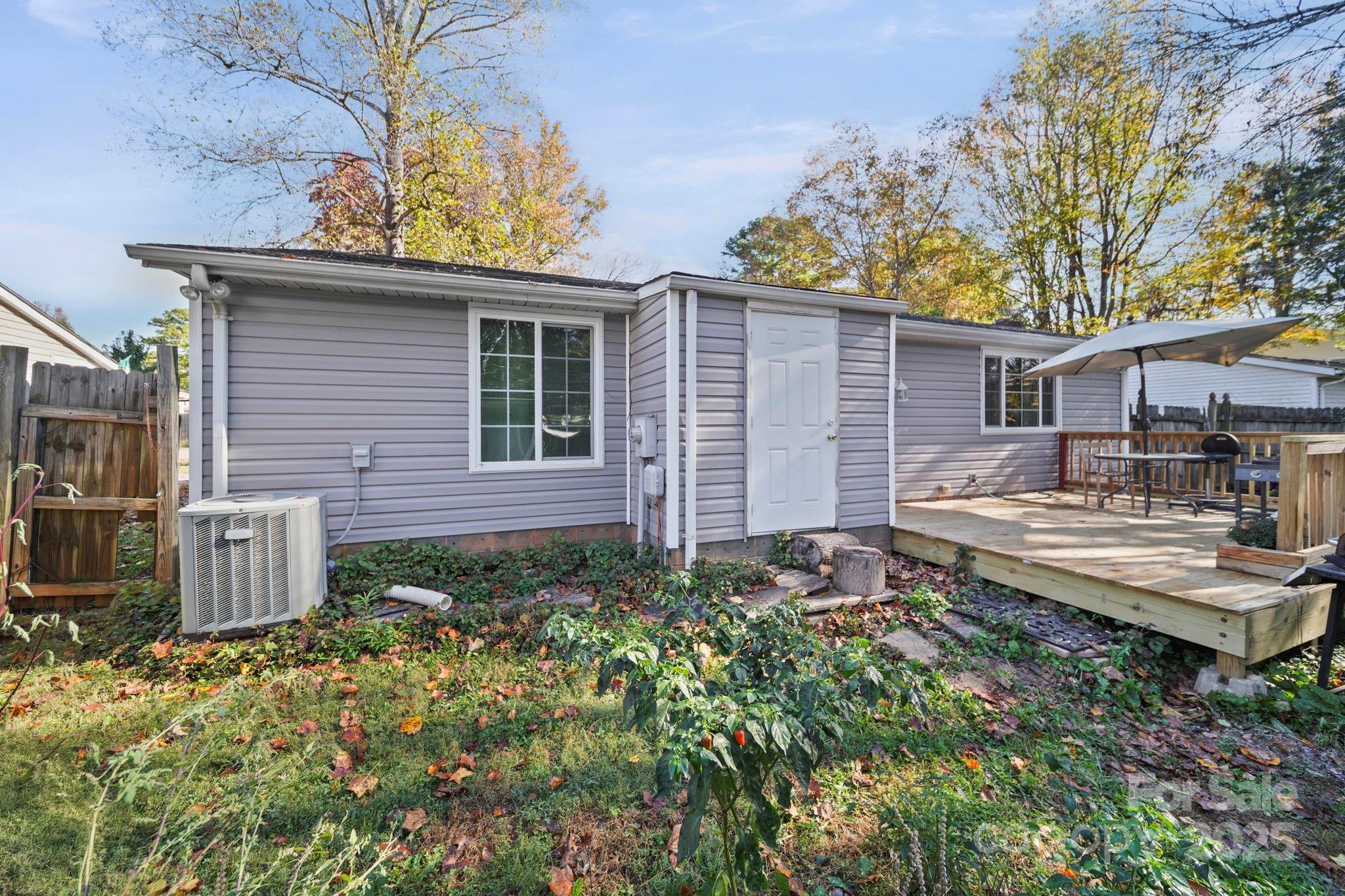4823 Smokehollow Road Charlotte, NC 28227 - Photo 30 of 31 a front view of a house with garden