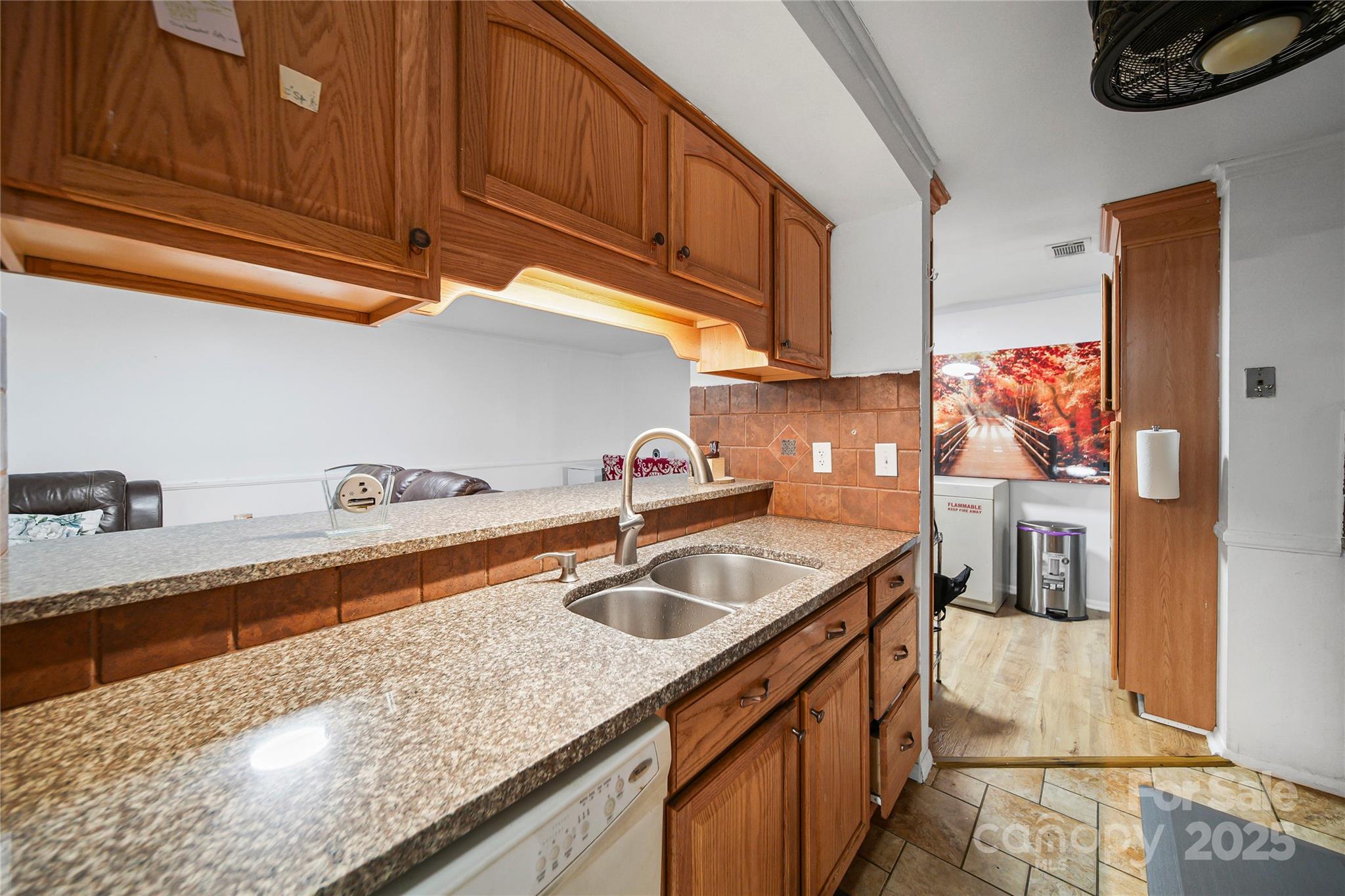4823 Smokehollow Road Charlotte, NC 28227 - Photo 10 of 31 a kitchen with stainless steel appliances granite countertop a sink a stove and cabinets