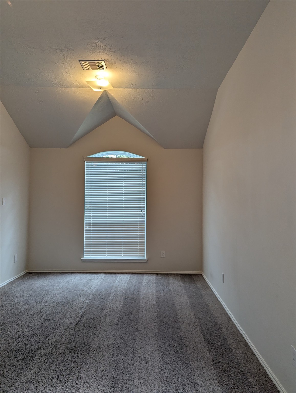 13319 Lansdown Street Rosharon, TX 77583 - Photo 3 of 22 an empty room with a window