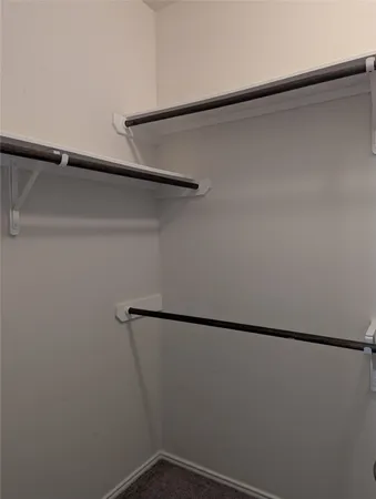 a view of a room with racks on the wall