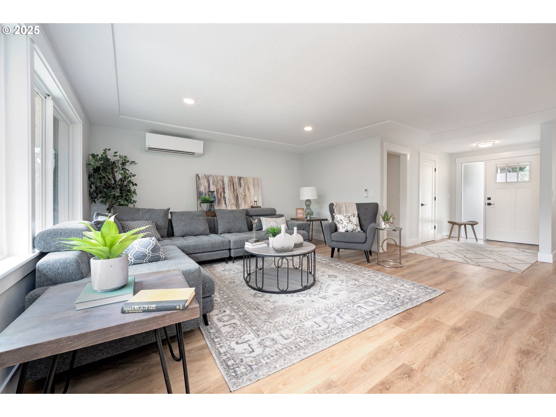 5775 Southeast Cesar Estrada Chavez Boulevard Portland, OR 97202 - Photo 15 of 43 a living room with furniture and a potted plant