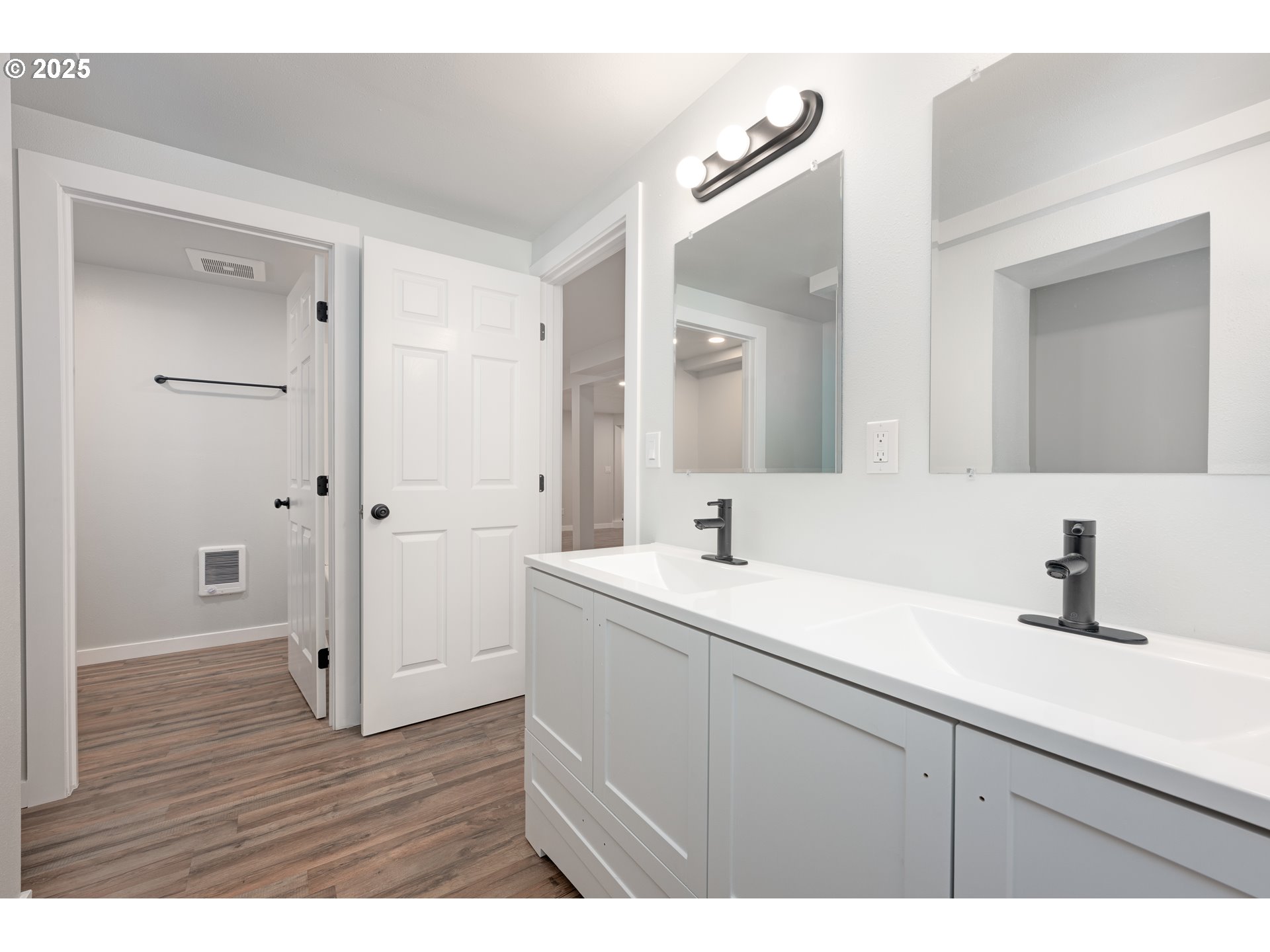 5775 Southeast Cesar Estrada Chavez Boulevard Portland, OR 97202 - Photo 39 of 43 a bathroom with a sink and a mirror