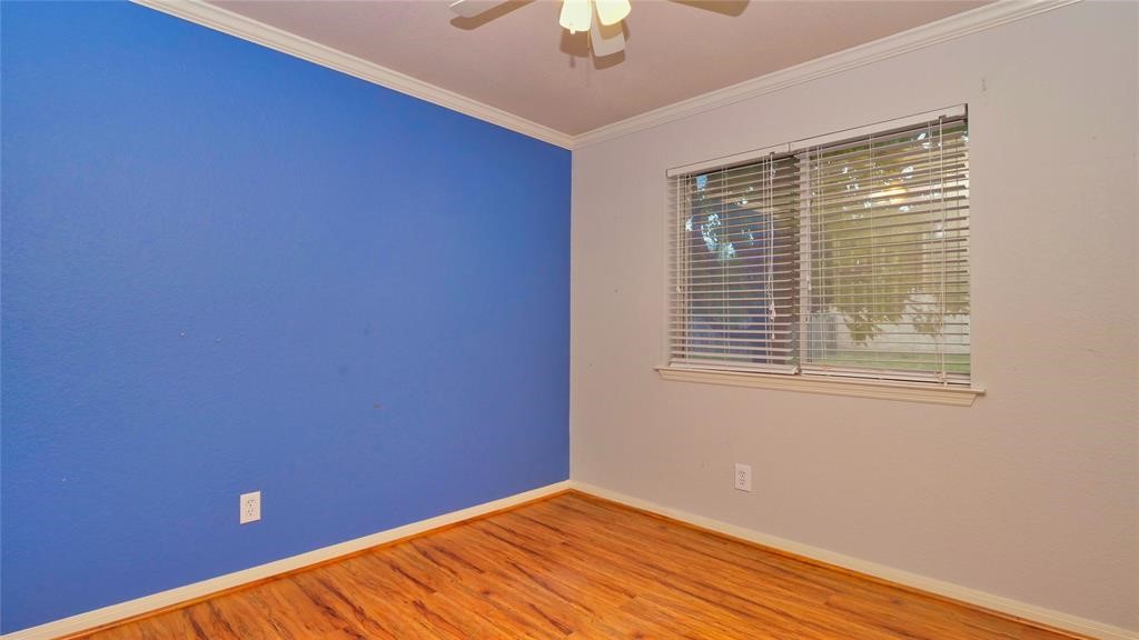 10235 Riderdale Park Lane Houston, TX 77070 - Photo 11 of 16 a view of a room with a window