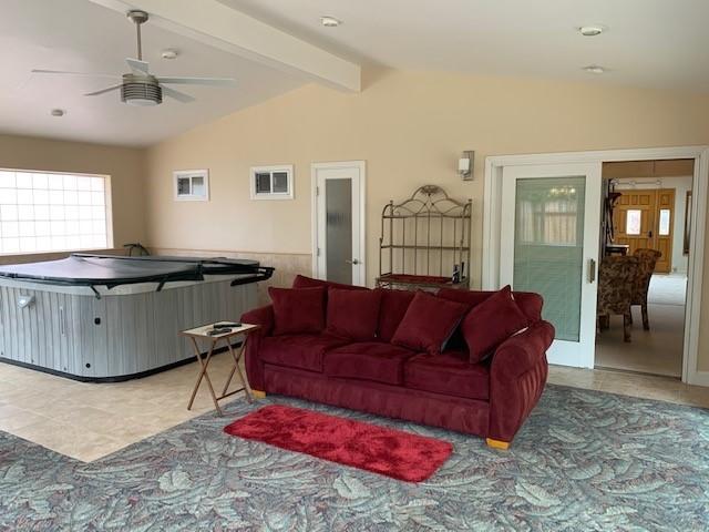 6288 Muirfield Drive Goleta, CA 93117 - Photo 18 of 26 a living room with furniture and a chandelier