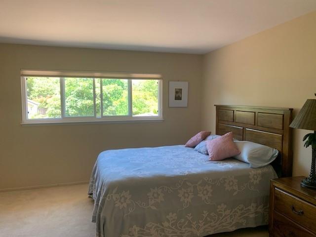 6288 Muirfield Drive Goleta, CA 93117 - Photo 20 of 26 a bedroom with a bed and window