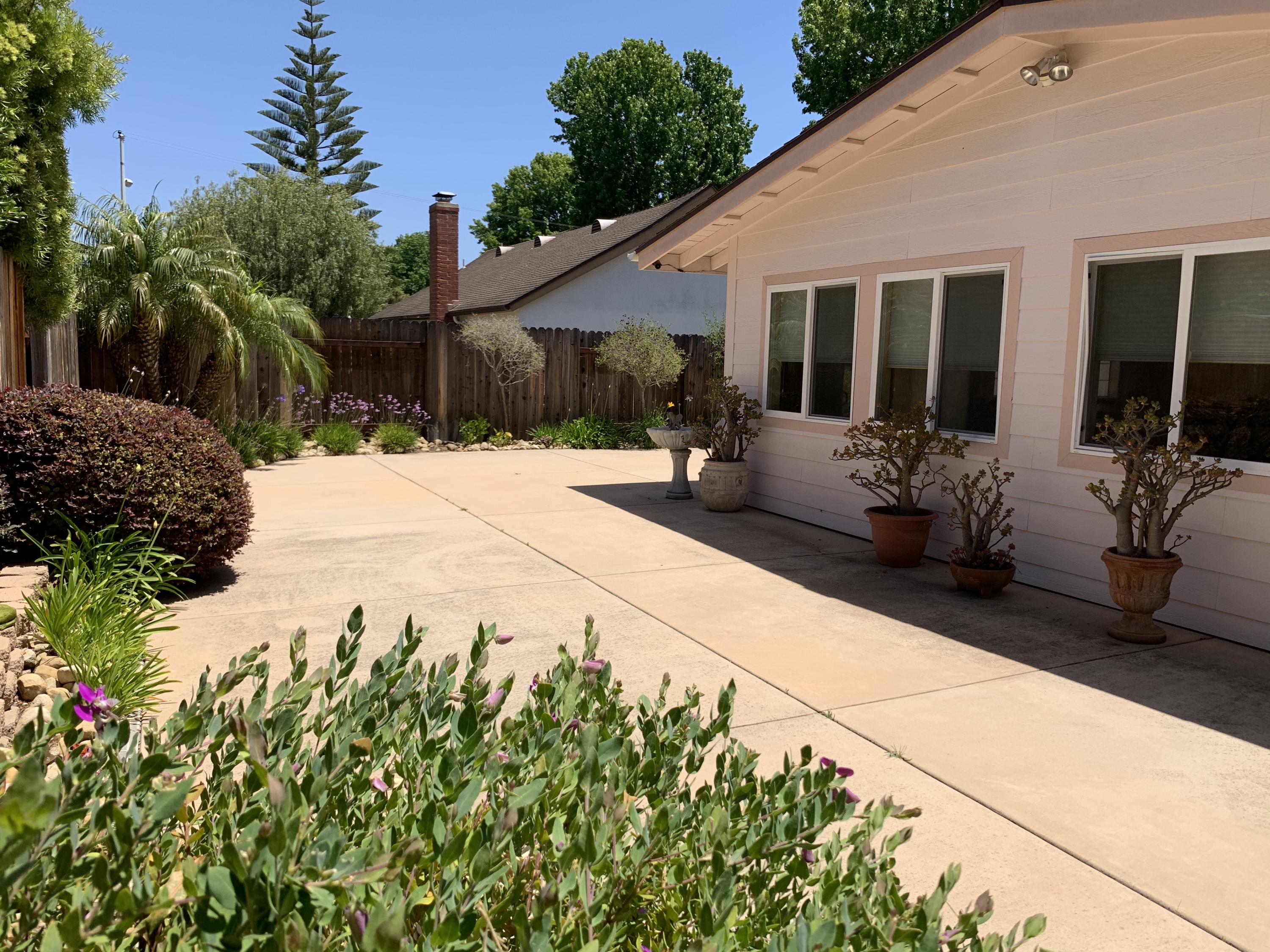 6288 Muirfield Drive Goleta, CA 93117 - Photo 2 of 26 a house with yard in front of it