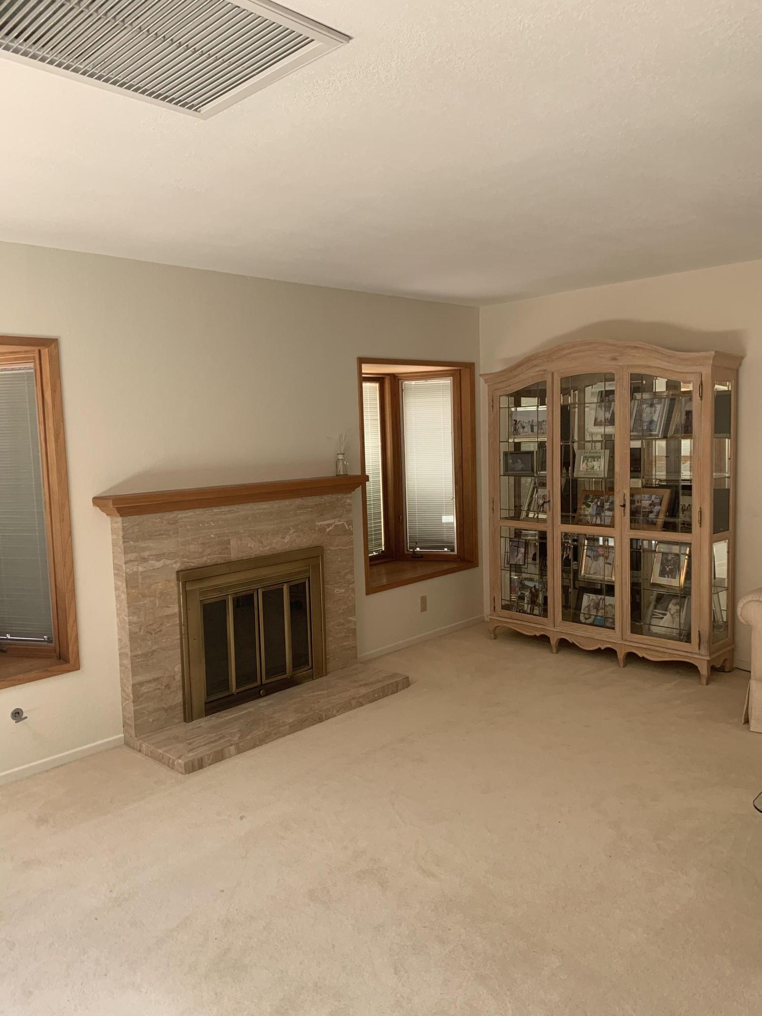 6288 Muirfield Drive Goleta, CA 93117 - Photo 5 of 26 an empty room with fireplace
