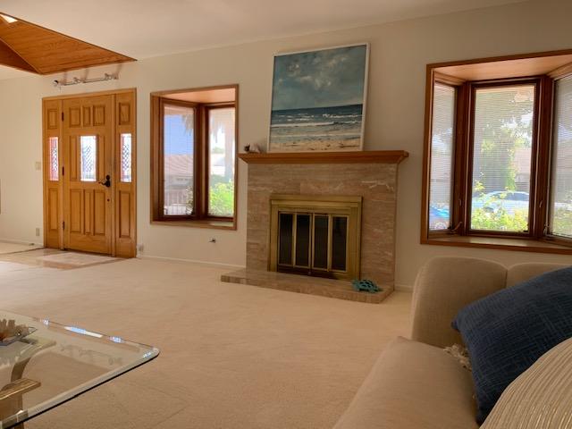 6288 Muirfield Drive Goleta, CA 93117 - Photo 8 of 26 a living room with furniture and a fireplace