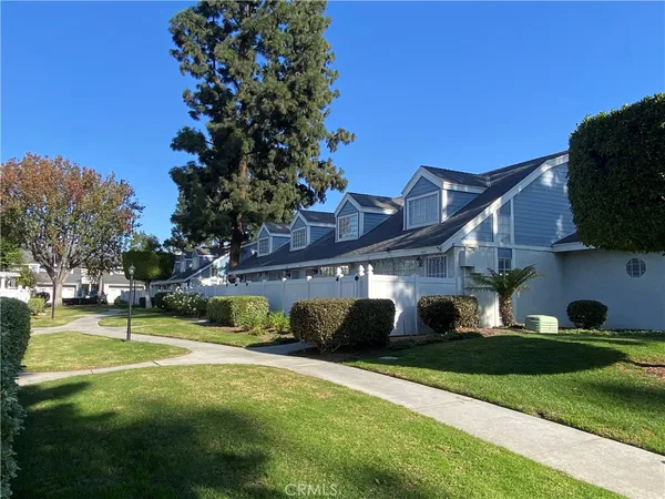 a view of a house with a big yard