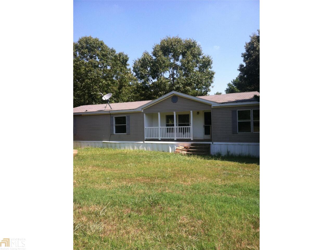 459 Gribble Road Southeast Aragon, GA 30104 - Photo 1 of 1 a swimming pool with outdoor seating and yard