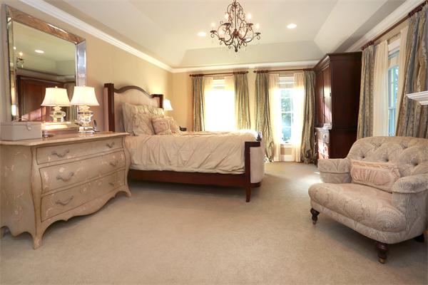 63 Sheffield Road Boxford, MA 01921 - Photo 18 of 30 a spacious bedroom with a bed and window