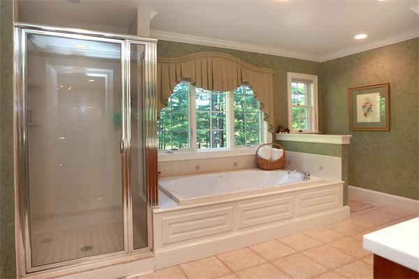 63 Sheffield Road Boxford, MA 01921 - Photo 19 of 30 a bathroom with a bathtub and a shower