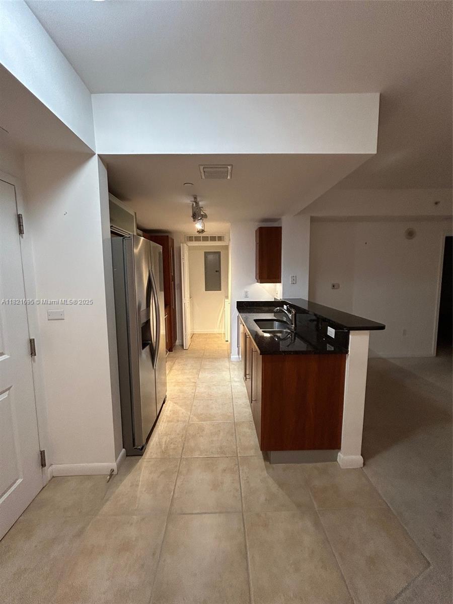 Kendall Miami, FL 33156 - Photo 16 of 16 a kitchen with stainless steel appliances granite countertop a refrigerator and a stove